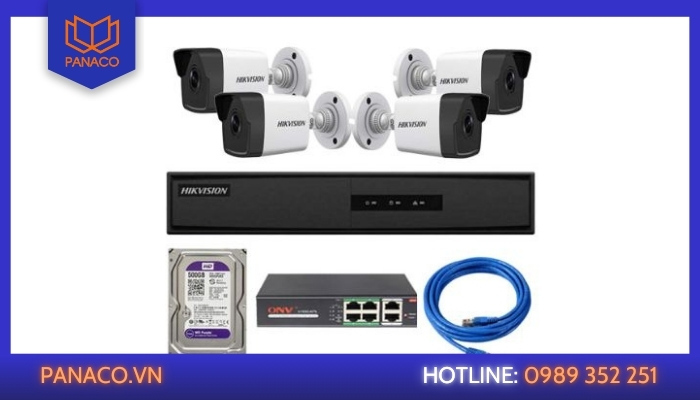 Bộ thiết bị gồm bốn camera, đầu ghi, ổ cứng, bộ chia PoE, dây mạng